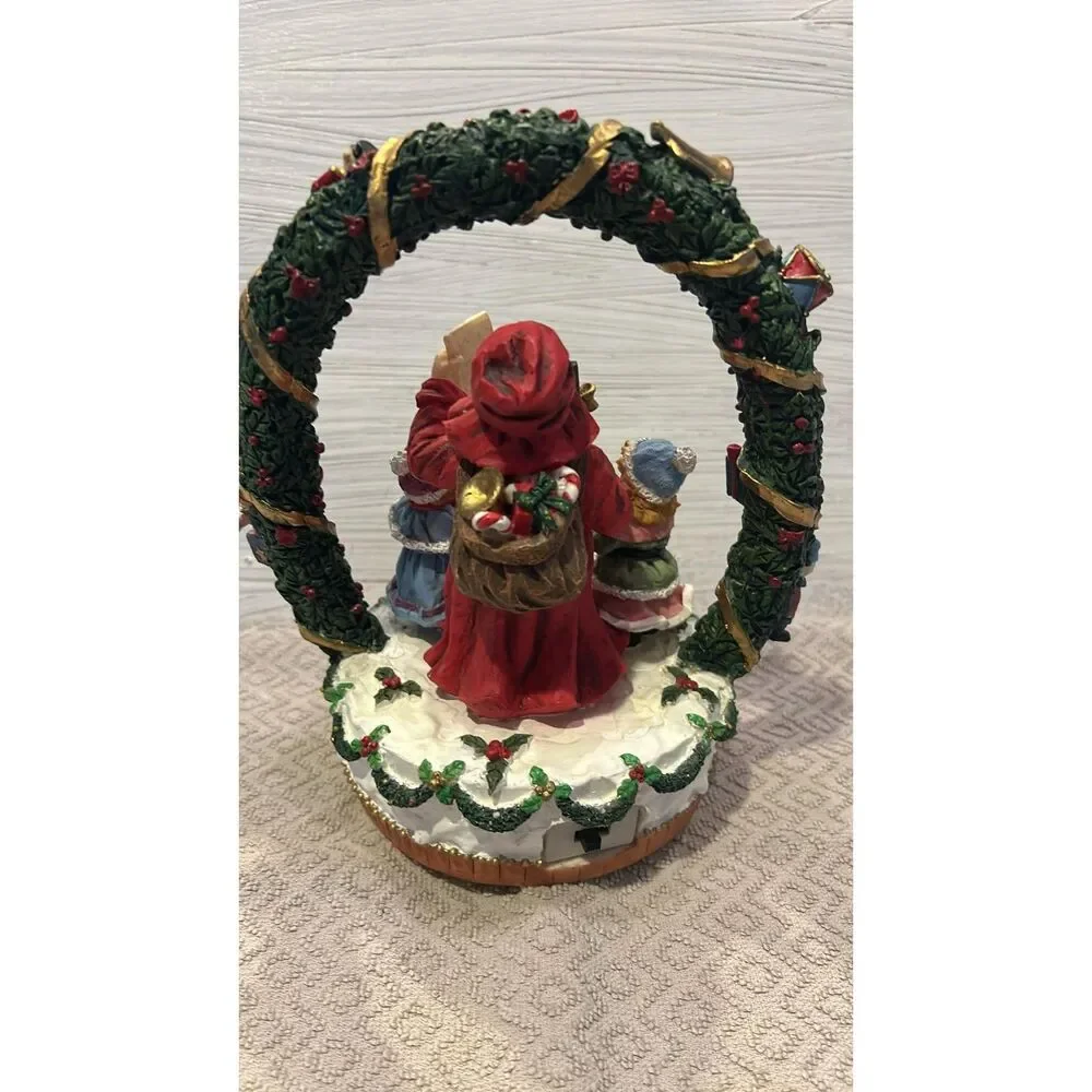 Vintage Santa Under Holy Arch wi5th Christmas Carolers Plays music and light up